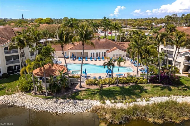 Community pool with a water view