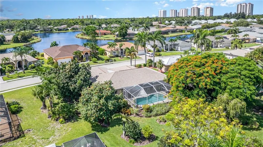Aerial view of residential area with a large body of water