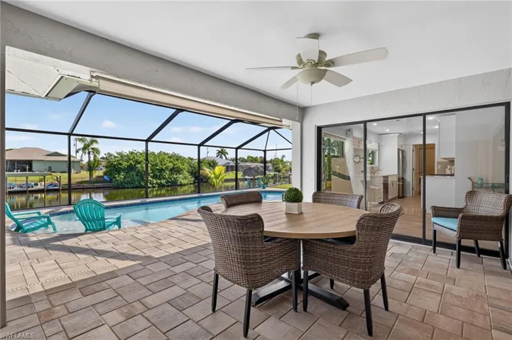 Under-truss shaded outdoor living space within the screened lanai!