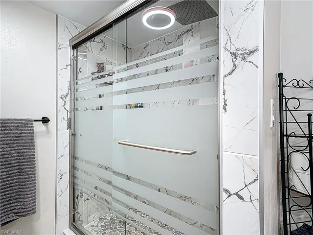 Updated walk-in shower in the upstairs bath