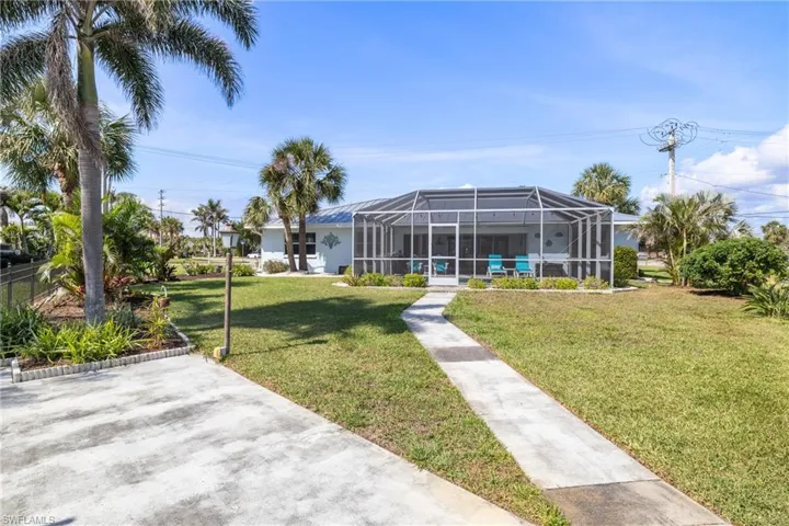 View of yard featuring a lanai