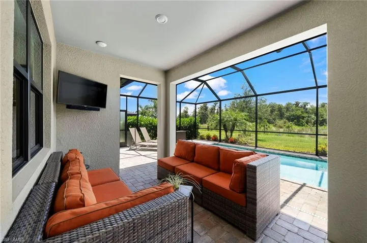 Sunroom / solarium featuring a wealth of natural light