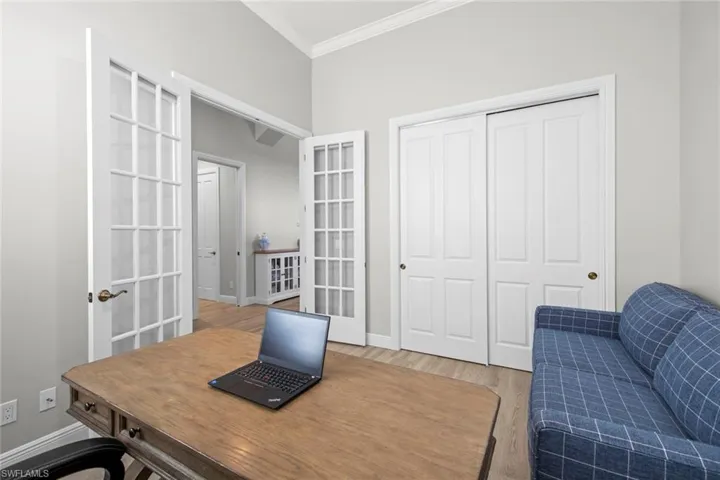 1st guest bedroom w/closest, French doors