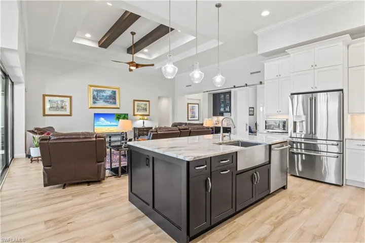 Enjoy cooking and entertaining from this beautiful kitchen - lots of extra cabinets and nothing ordinary!  An oversized smart sink makes food prepping easy!