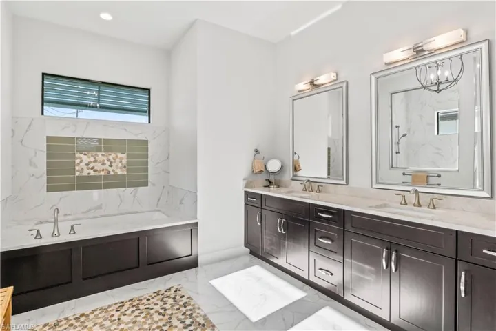 Primary Bathroom double vanities and neutral soothing palette!