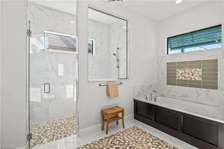 Stunning, serene, bathed with natural light and a fully functional bathroom with walk in closets and even a bidet!