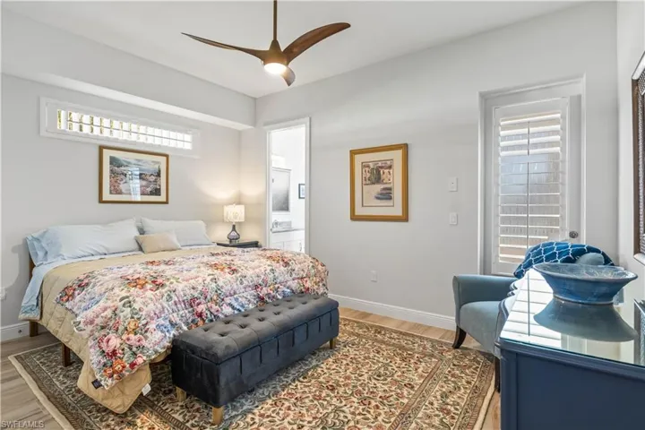 Guest bedroom with pool bath and access to the outside patio!