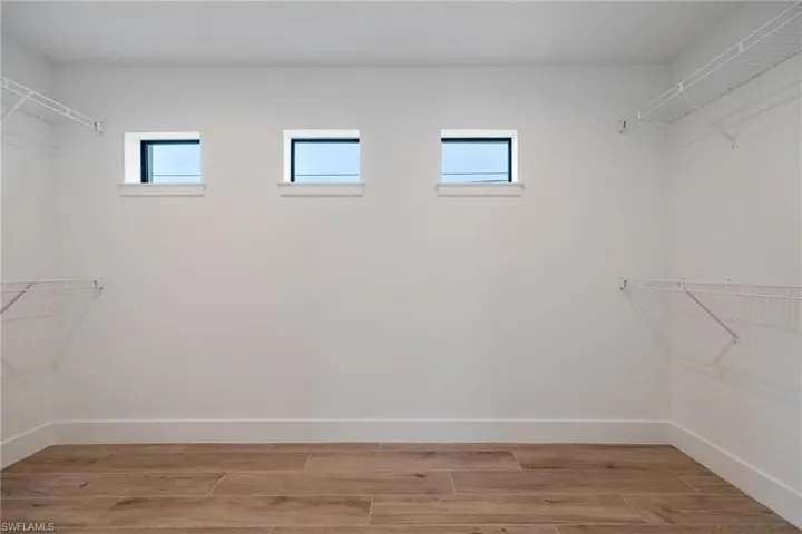Large Primary Bedroom Walk-In Closet