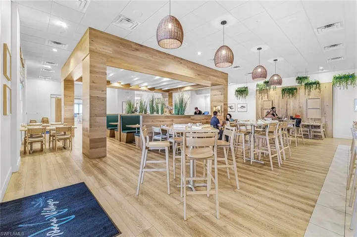 Open-concept commercial space featuring wood-finish flooring throughout