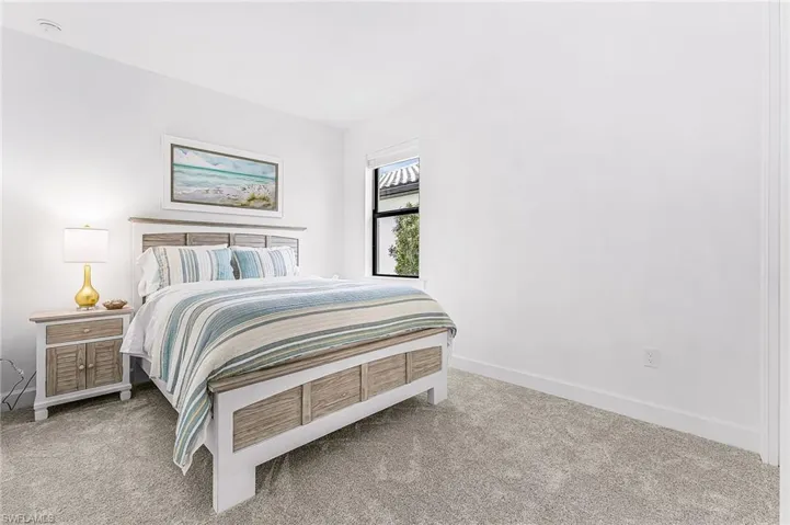 Neutral wall paint with carpeted flooring