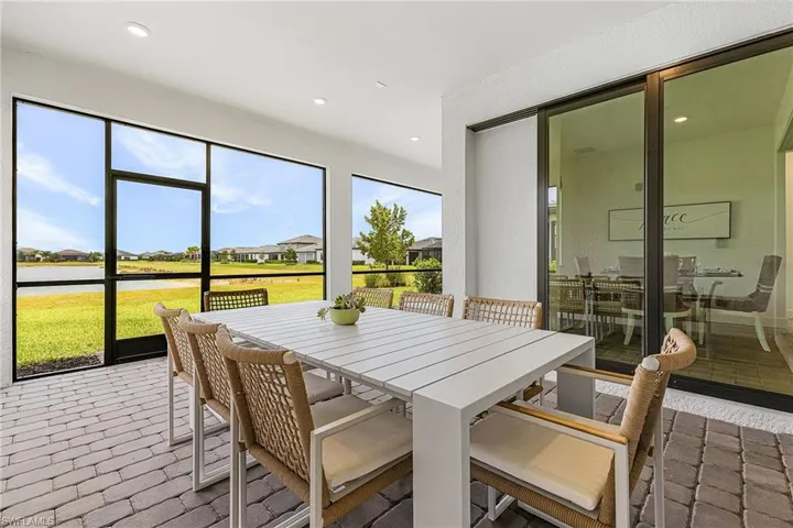 Screened lanai featuring paver flooring