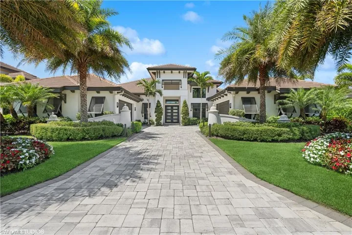 Mediterranean / spanish-style home featuring a front yard