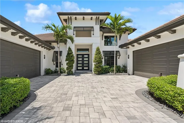 View of front of home featuring a garage