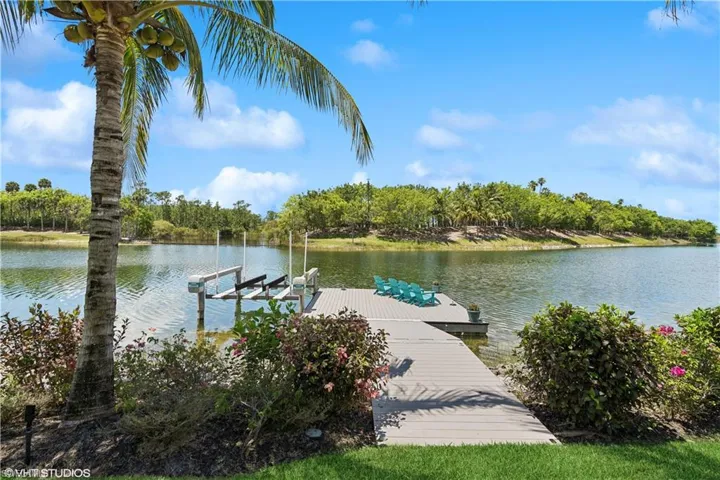 Dock area featuring a water view