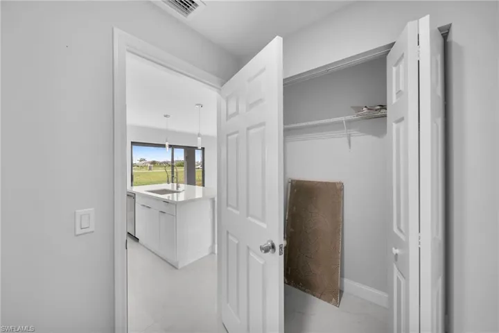 Closet featuring sink