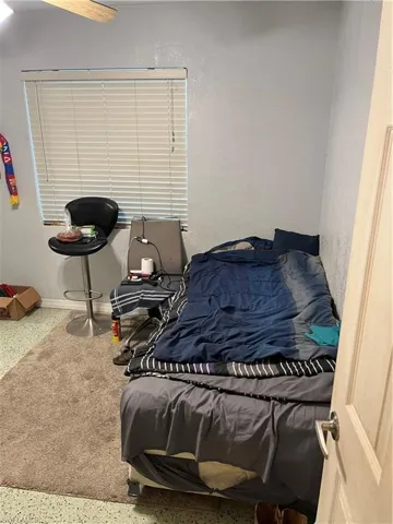 Bedroom featuring ceiling fan