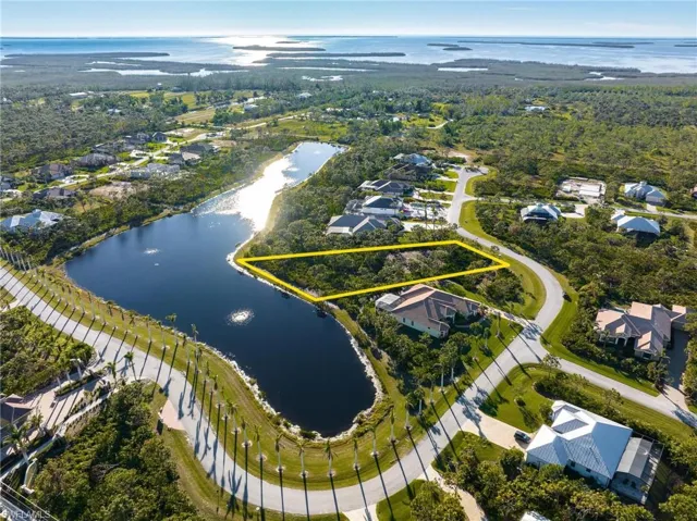 Aerial view of residential area with a nearby body of water