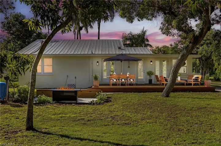 View of yard featuring a Cedar storage shed