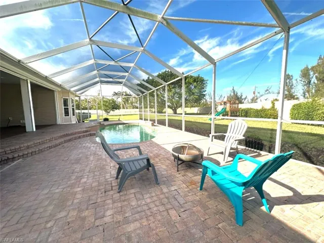 Pool area with deck and huge fenced