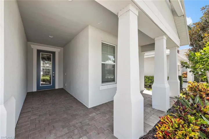 Add a couple of rocking chairs and your’re set to enter this inviting home.