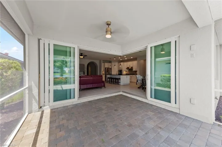 Disappearing sliders lead from the great room and dining area onto the lanai.