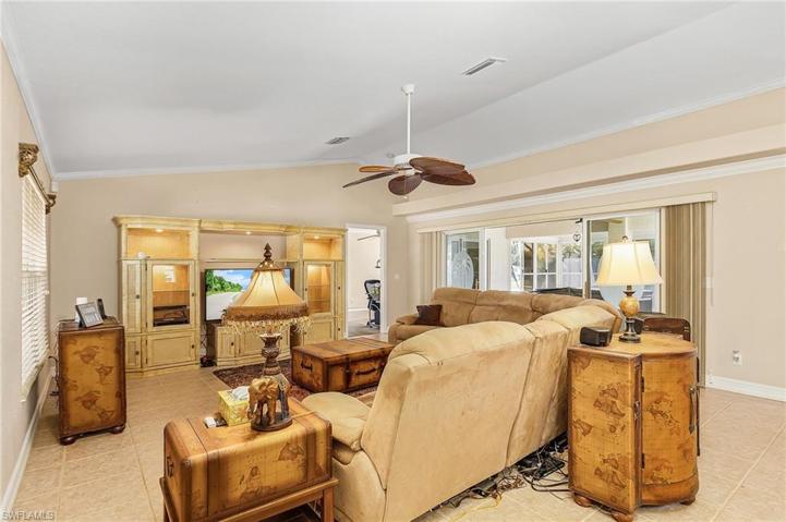 Living room with sliding glass doors out to the lanai