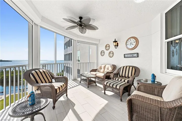 Enjoy unobstructed panoramic views of the Caloosahatchee River and marina, with ever-changing boat traffic creating a captivating waterfront backdrop.
