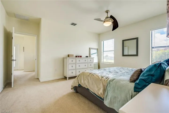 Bedroom with carpet floors and ceiling fan