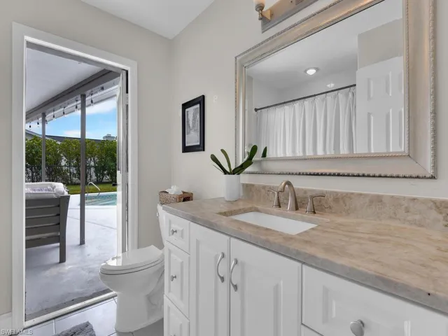 Bathroom with vanity and toilet