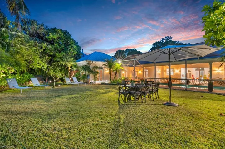 View of yard at dusk
