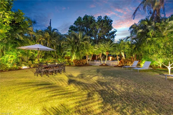 View of yard at dusk