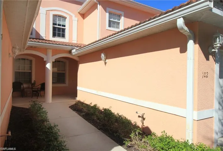 View of property exterior with a patio