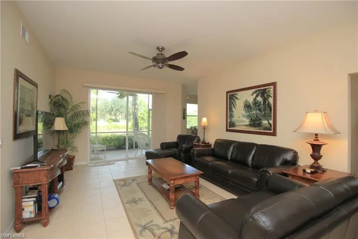 Tiled living room with ceiling fan