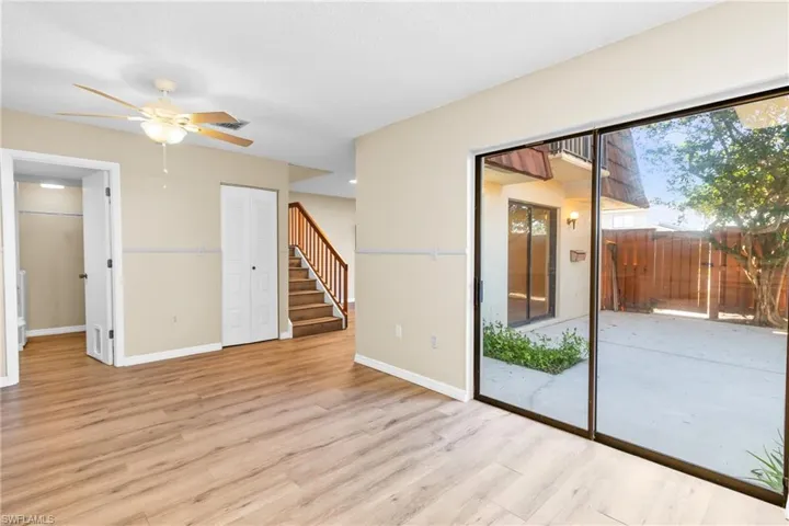 Spare room featuring ceiling fan and light hardwood / wood-style flooring