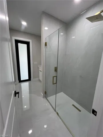 and a shower with door