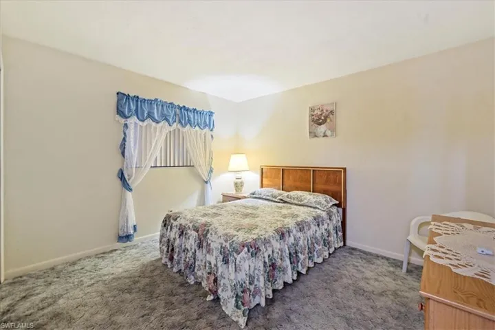 Bedroom with carpet flooring