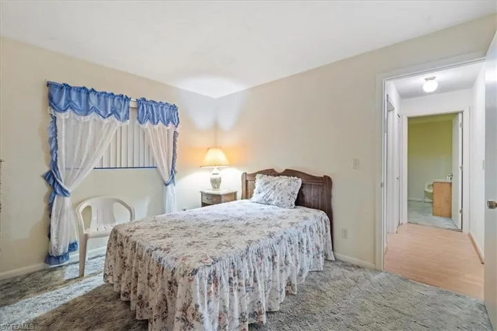 Bedroom with carpet
