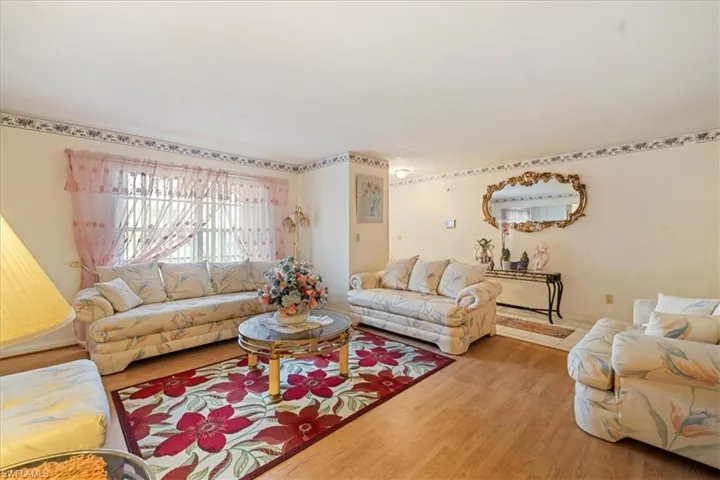 Living room featuring hardwood / wood-style flooring