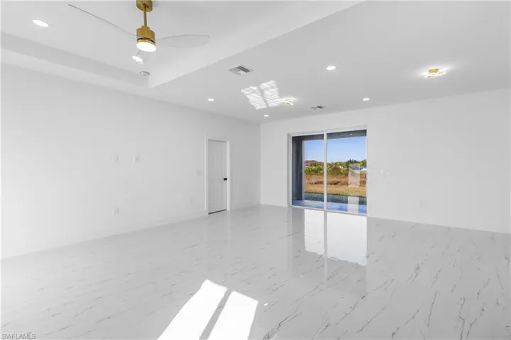 Unfurnished room featuring recessed lighting and ceiling fan
