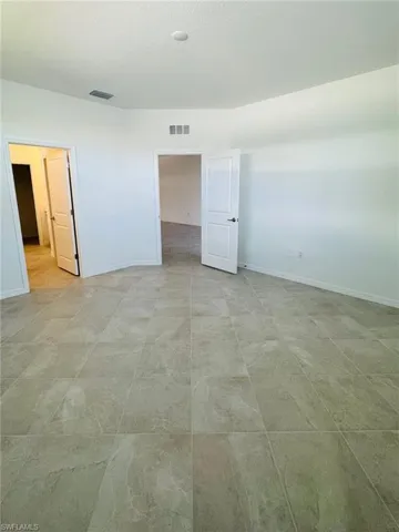 Primary Bedroom featuring a healthy amount of sunlight