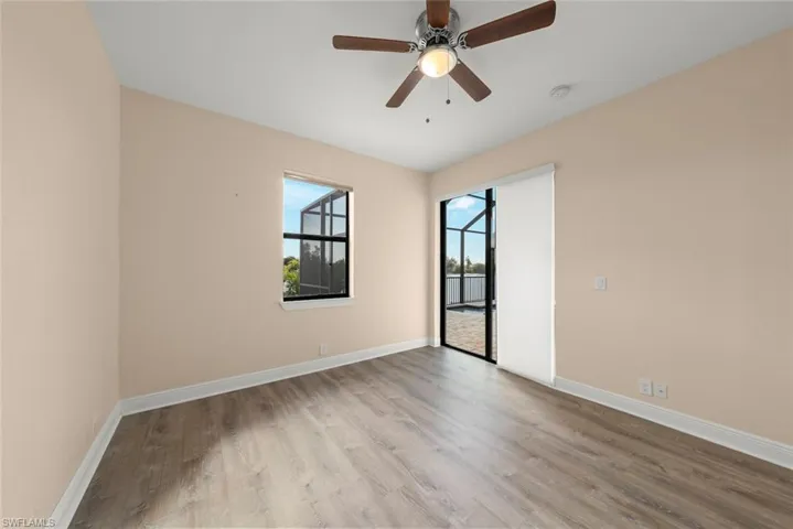 Guest Bedroom with view to pool and lake