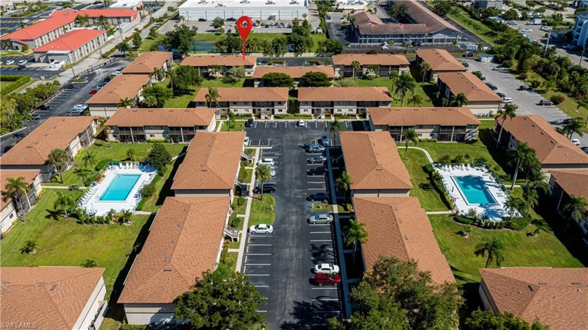 Aerial overview of property's location with a pool