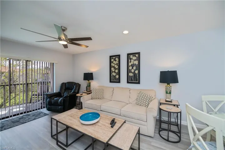 Living area featuring recessed lighting, light wood-style floors, and ceiling fan