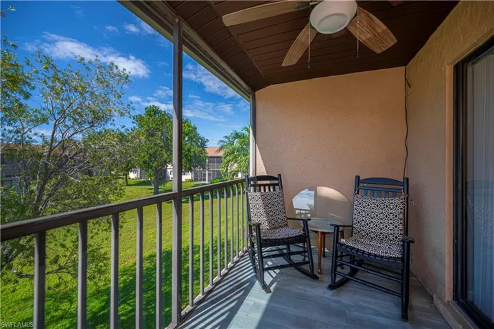 Balcony with ceiling fan and area for grilling