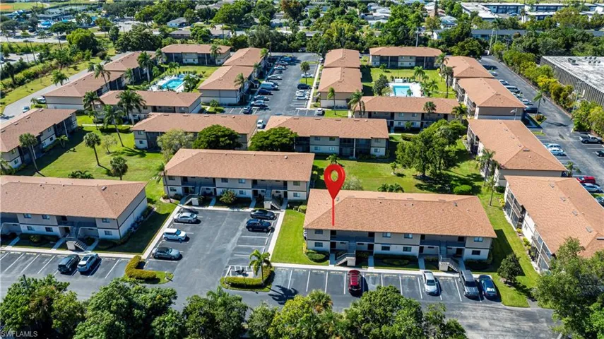 Drone / aerial view of apartment complex / building