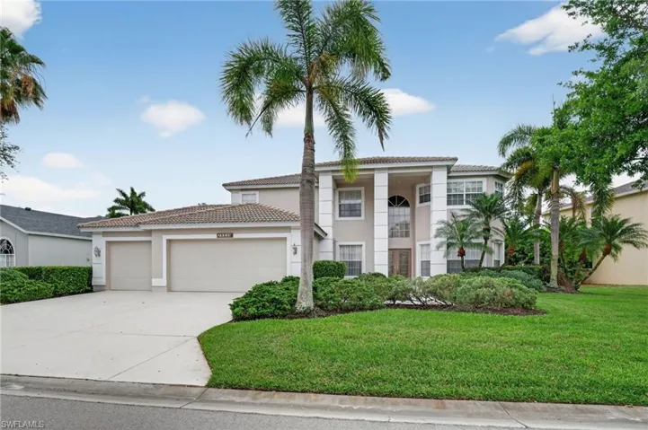 Lush landscaping, 3 car garage