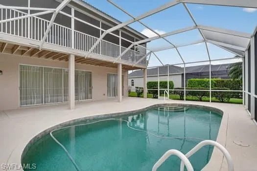 Screened pool with high pool cage
