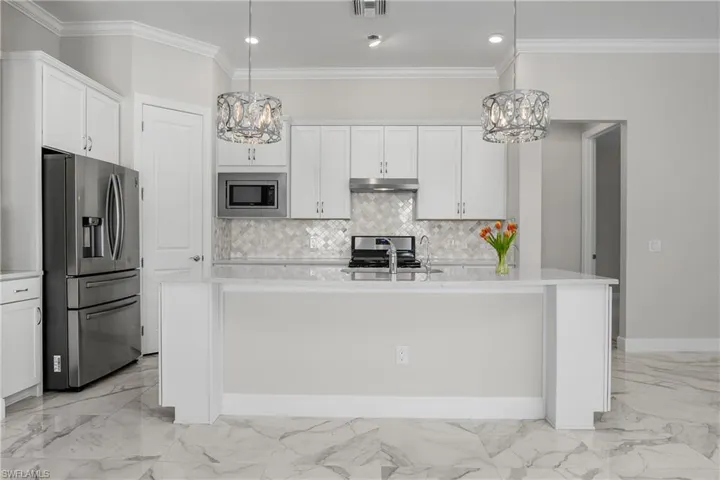 Kitchen is open and spacious and the perfect space for entertaining guests.