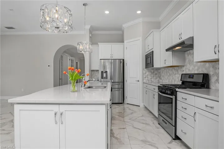 Plenty of cabinet space, oversized island fea