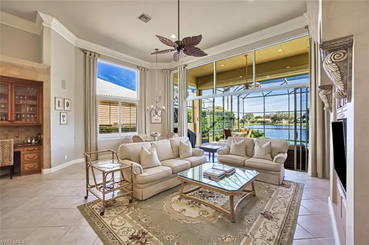 Family room boast natural light with a  beautiful lake view